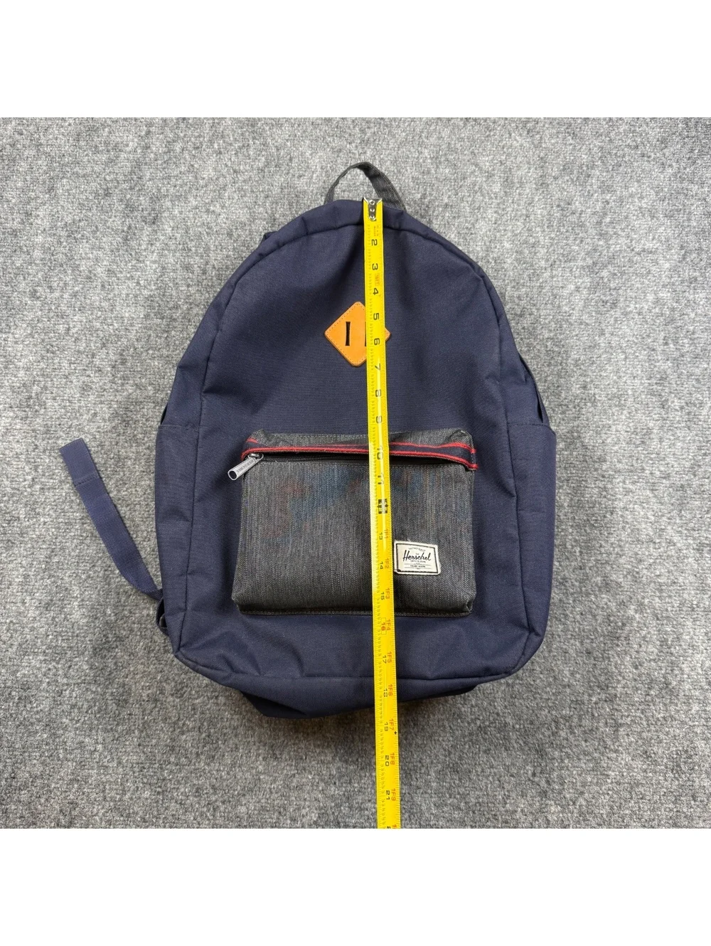 Herschel Navy Blue Backpack with Front Pocket and Red Striped Interior